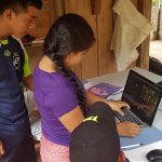 Community video-making workshop participants practice editing. Distrito Urracá, Panama
